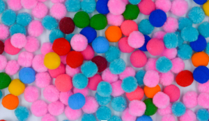 Mini pom POM adorned balloons